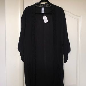 Brand new with tags. Shawl or Cover up